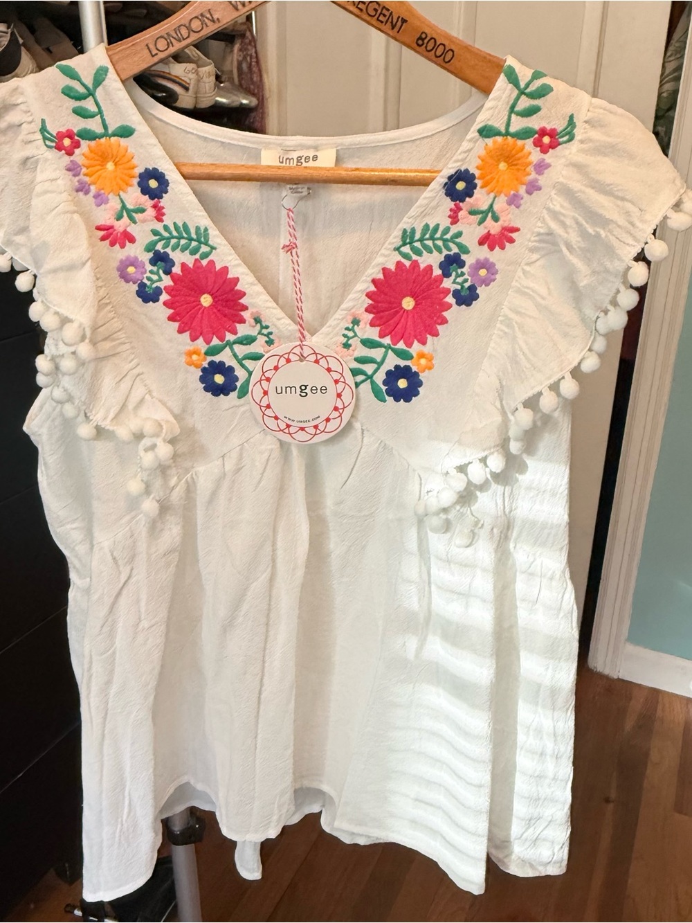 Umgee White Sleeveless Embroidered Pom-Pom V-Neck Blouse